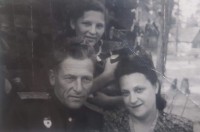 Zhanna Ezit with her parents